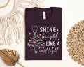 Shine Bright Like a Call Light Graphic Tee