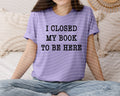 I Closed My Book to Be Here Graphic Tee